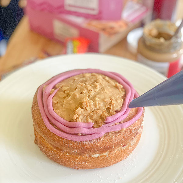 Fake Bake Recipe Peanut Butter and Jam - spread peanut butter and pipe frosting in middle
