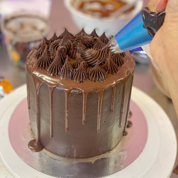 Fake Bakes Chocolate Orange Cake Recipe - piped frosting