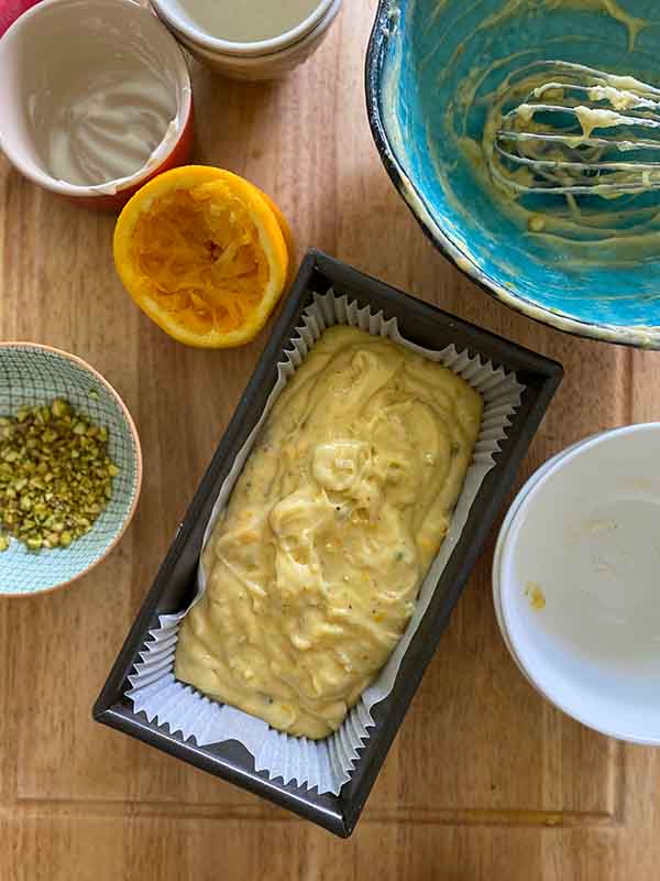 Orange and Pistachio Loaf Cake - batter in tin