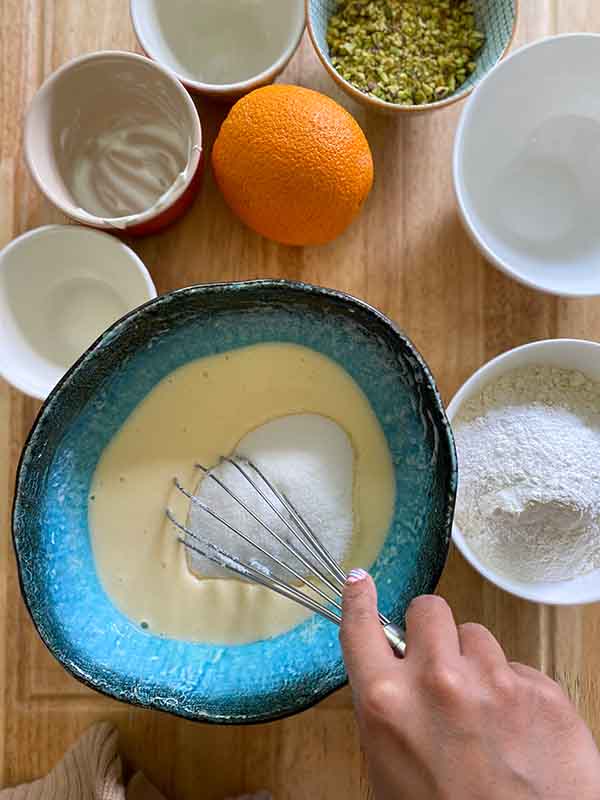 Orange and Pistachio Loaf Cake - hero sponge add sugar and salt