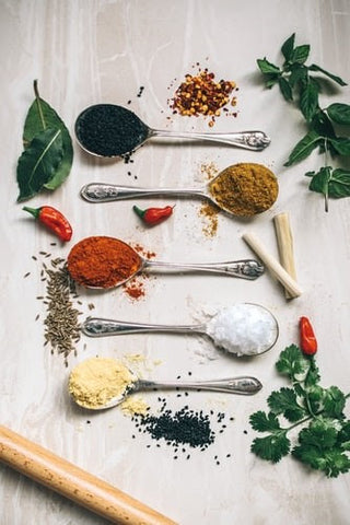 spices on spoons 