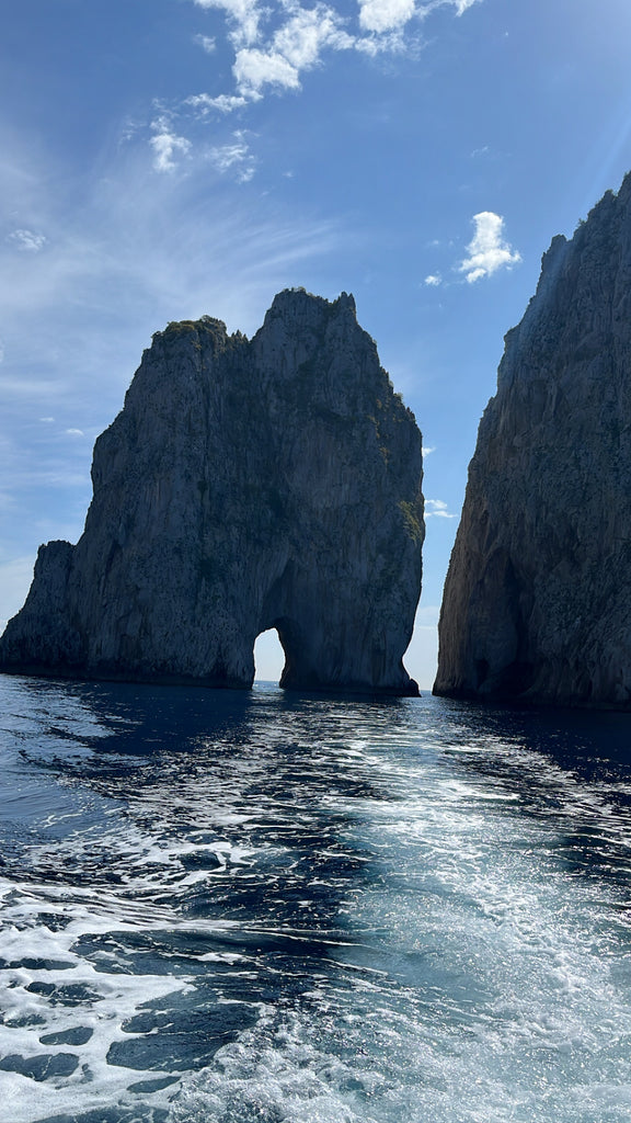 Large rocky standalone cliffs jutting out of the ocean