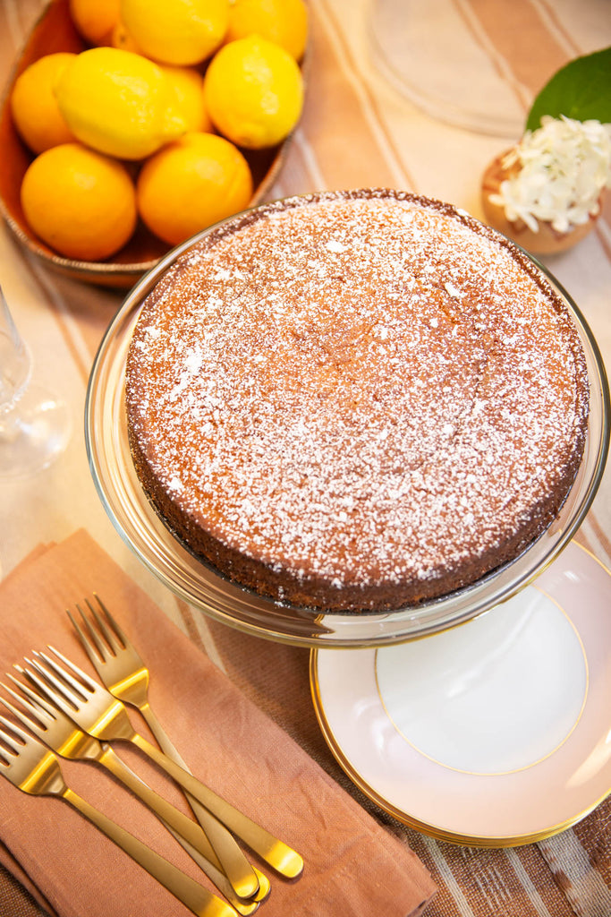 Citrus olive oil cake topped with a sprinkle of power sugar