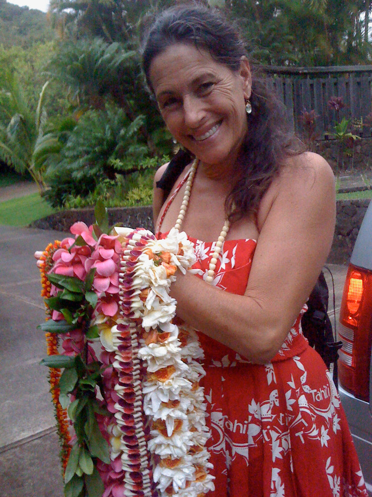 Woman holding leis