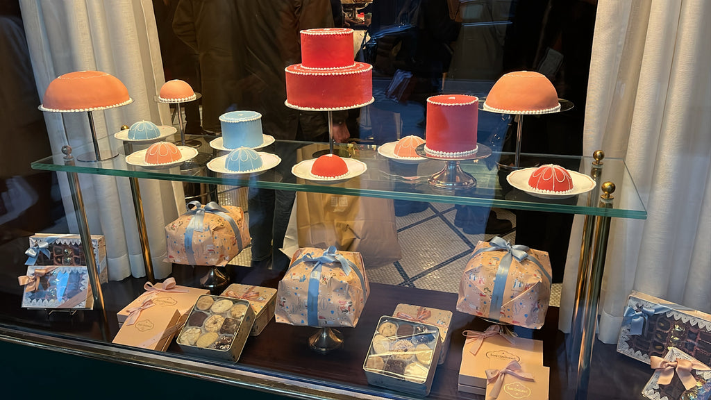 Cakes and baked goods in bakery window