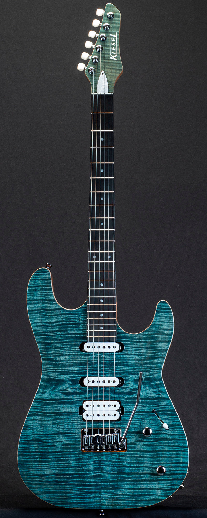 kiesel guitars theos gotoh tremolo T6G, mahogany body, flamed maple top, gloss top coat, rear of body natural clear RNC, inline gt headstock, painted headstock, 5-piece maple neck w/ 2 walnut stripes, tung oil neck, ebony fingerboard, 12" fingerboard radius, mother of pearl dot inlays, chrome hardware, white logo, HSS, m12sd bridge pickup, lithium single coils, white pickup coils, white pearloid tuner buttons, serial number 145767