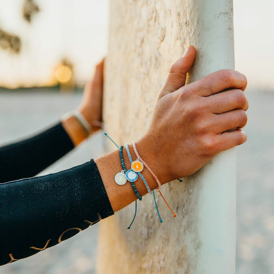 stacked beach bracelets surf girl style