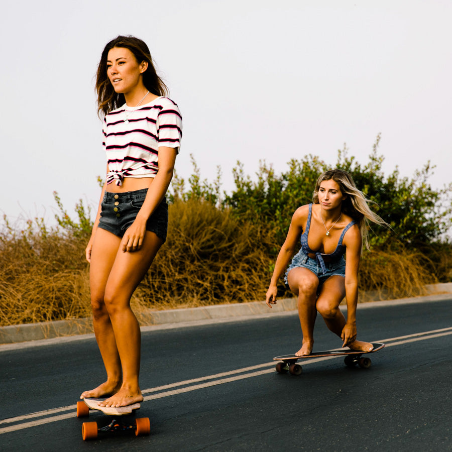 skater girls on skateboards - surfer girl style