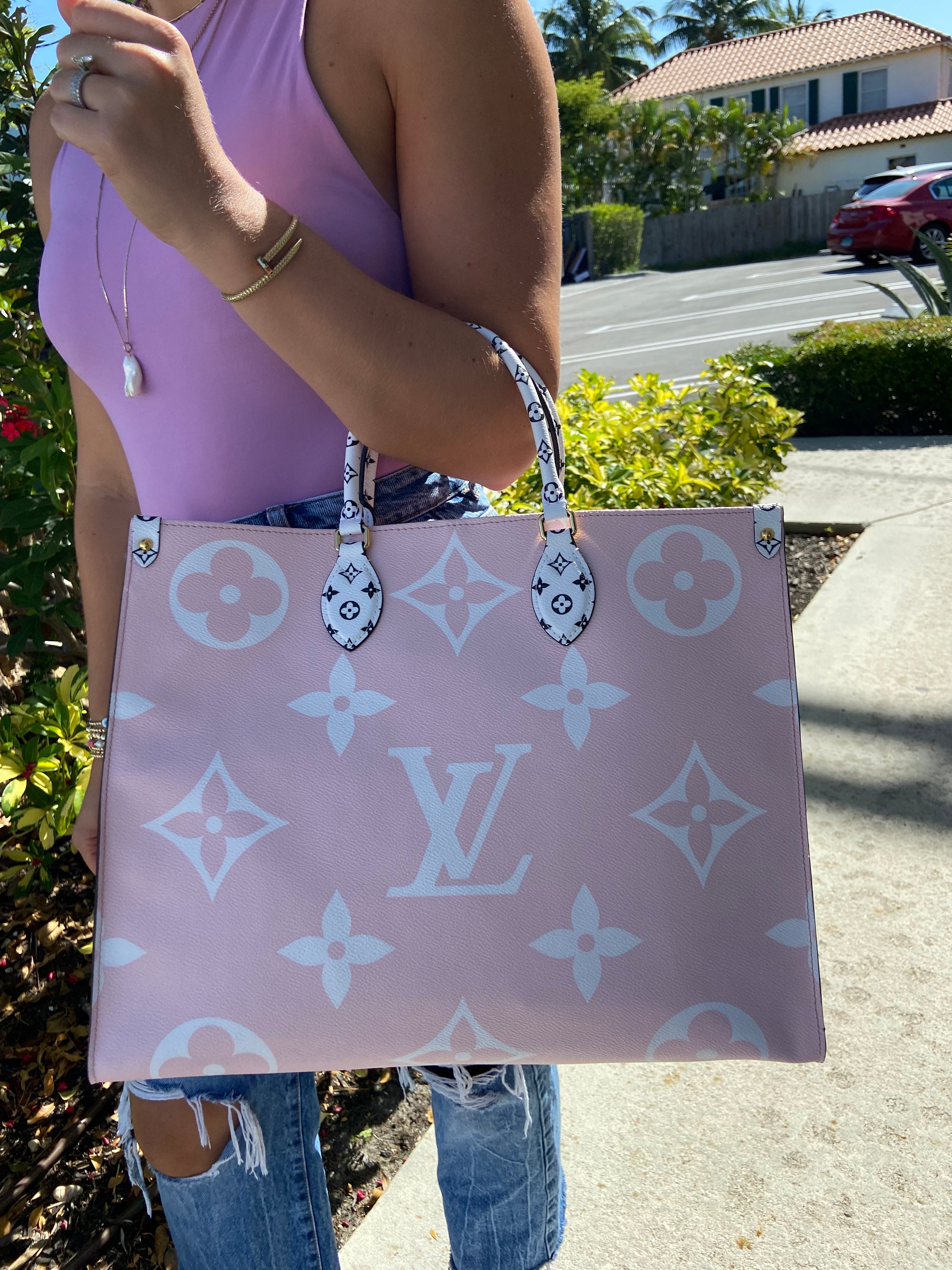 The Louis Vuitton OnTheGo MM Monogram Empreinte Giant By The Pool