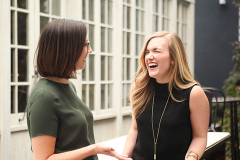 wearwell's co-founders Emily Kenney and Erin Houston laughing and talking about sustainable and ethical clothing and accessories
