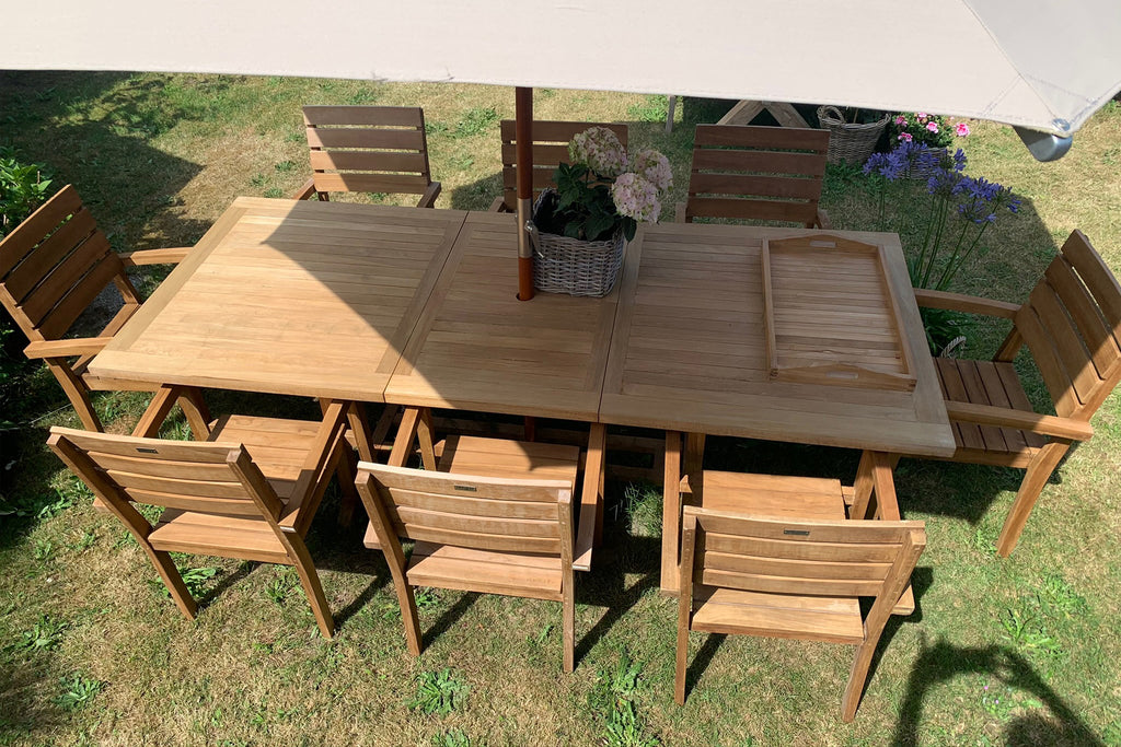 Rechthoekige tuintafel met teak design stapelstoelen