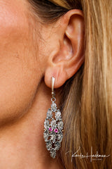 oak leaves in marquis pattern with garnets in the center,  earrings