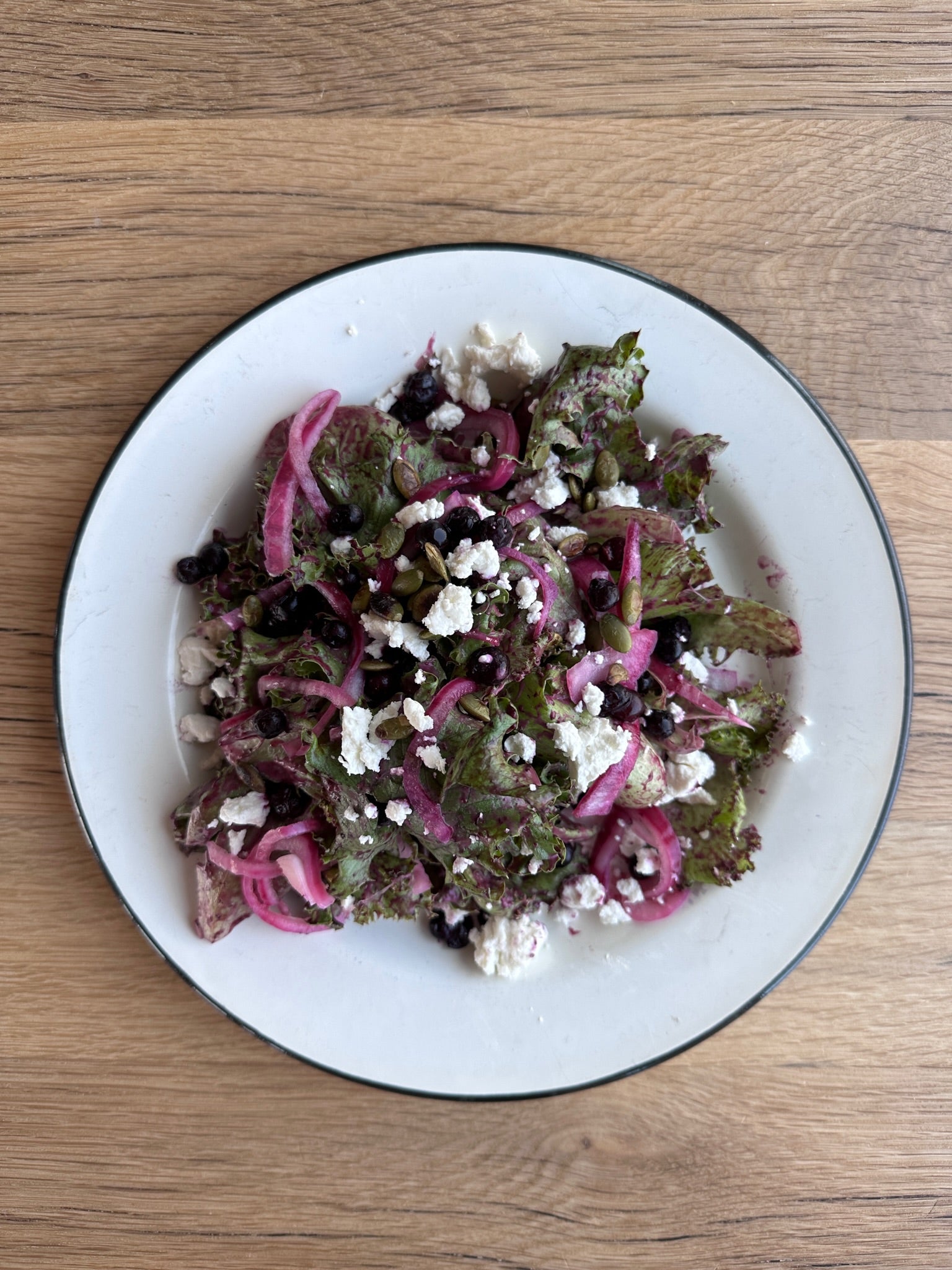 blueberry salad on white plate