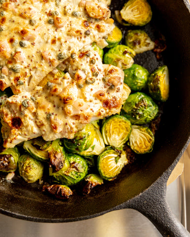 mustard roasted hake in a pan