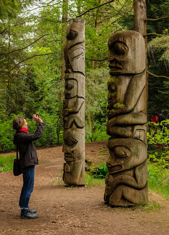 Suzuanne taking a photo of moss at VanDusen Gardens, Vancouver 