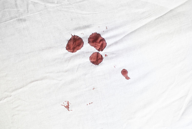 bloodstains on white sheet