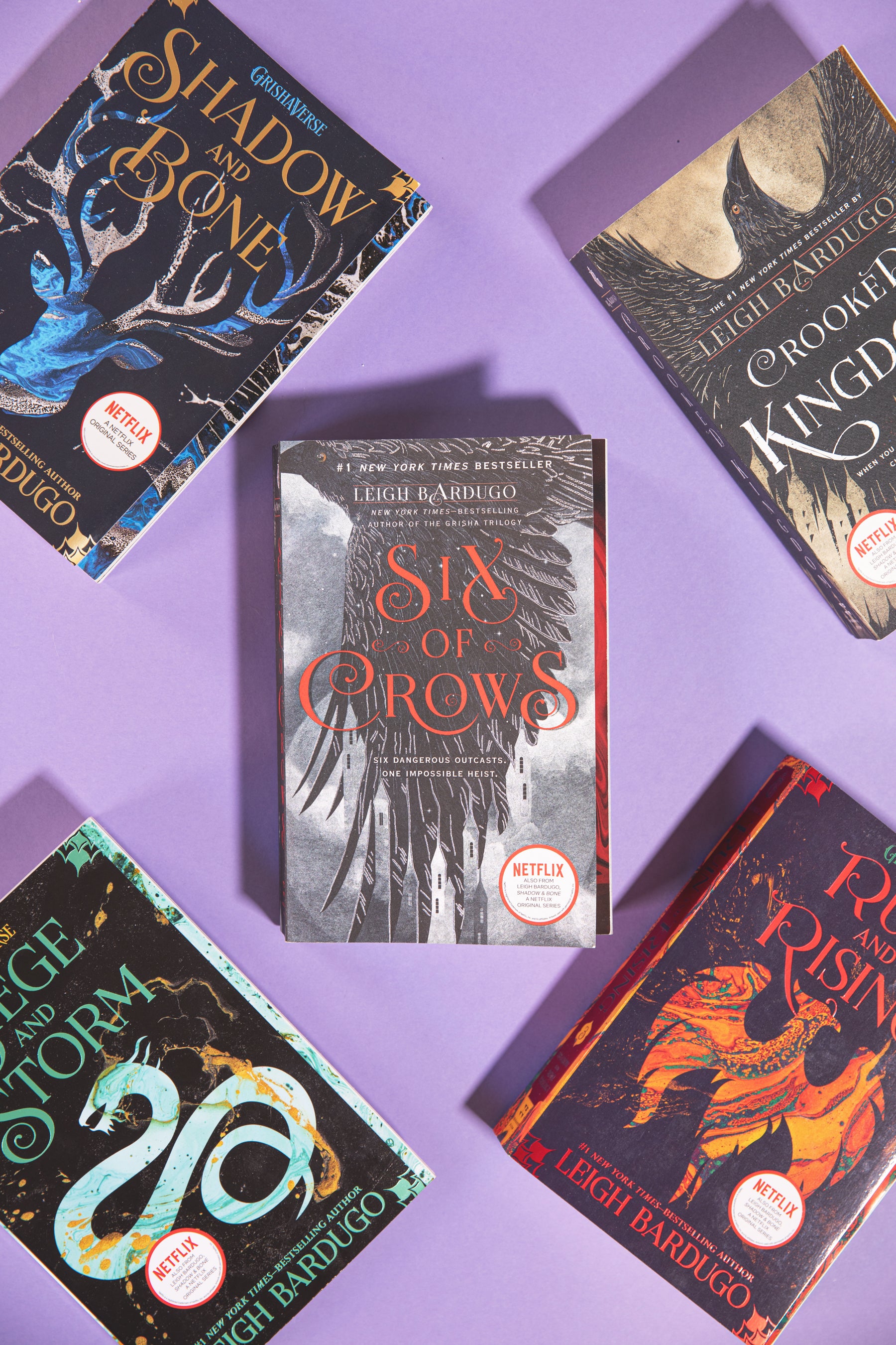 Six of Crows book, with the full Grishaverse series by Leigh Bardugo