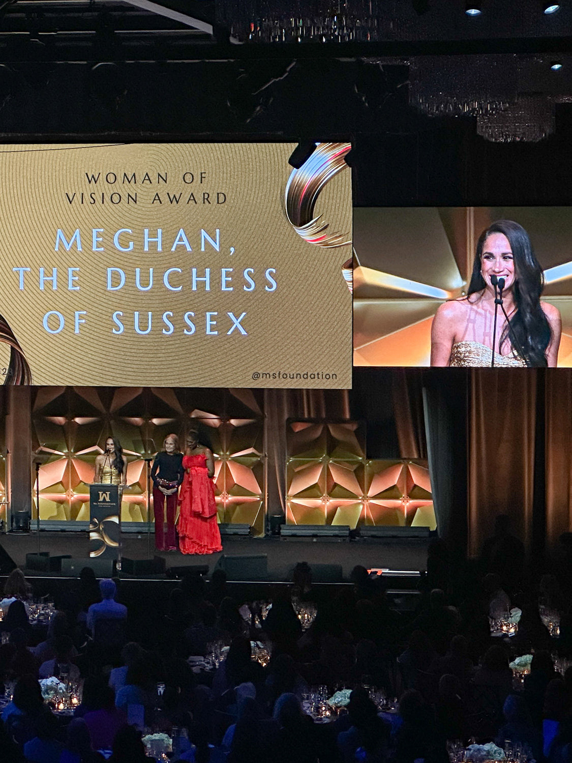 meghan, duchess of sussex on stage speaking at the ms foundation gala