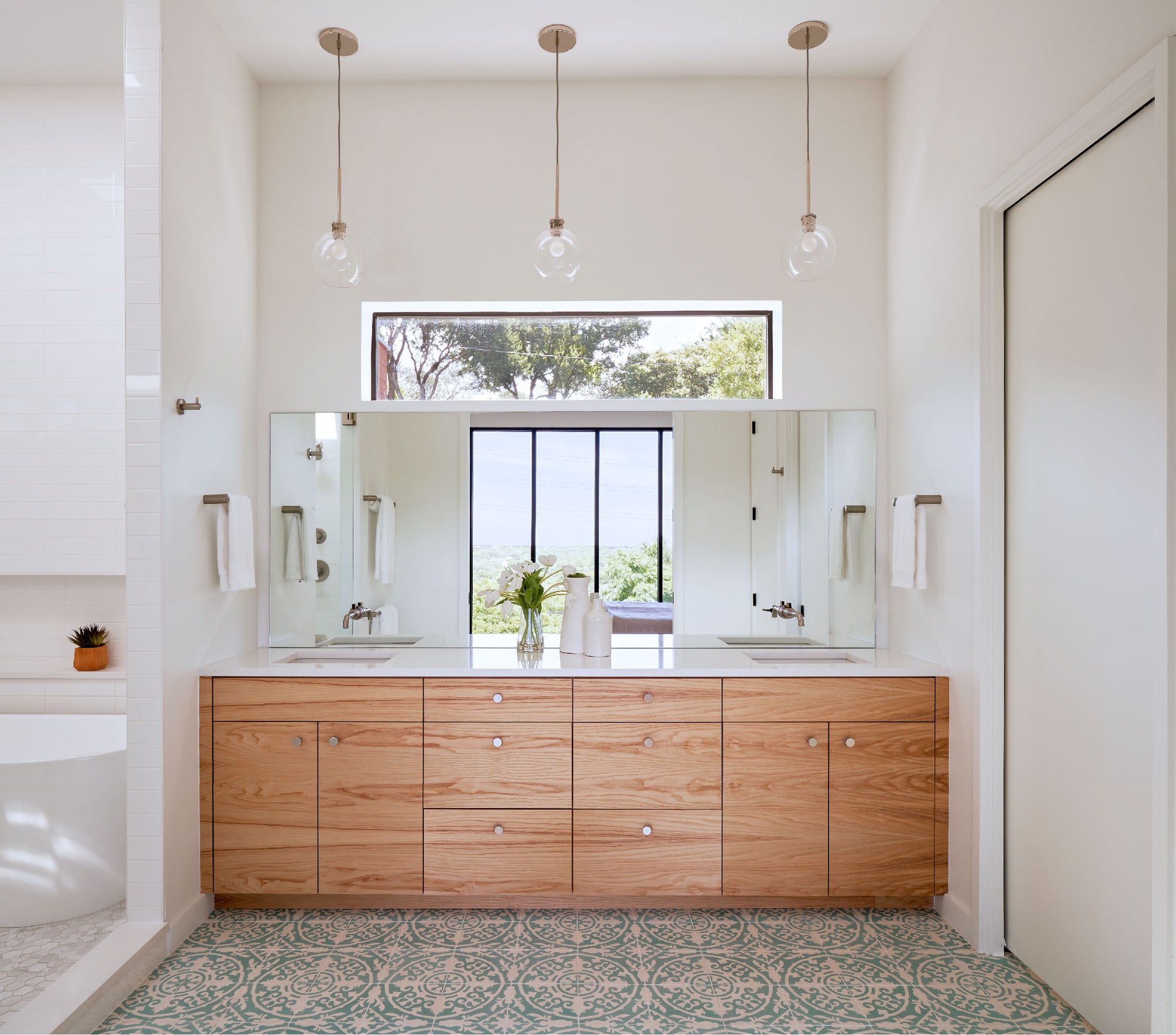 Modern master bathroom with white and gray tiles