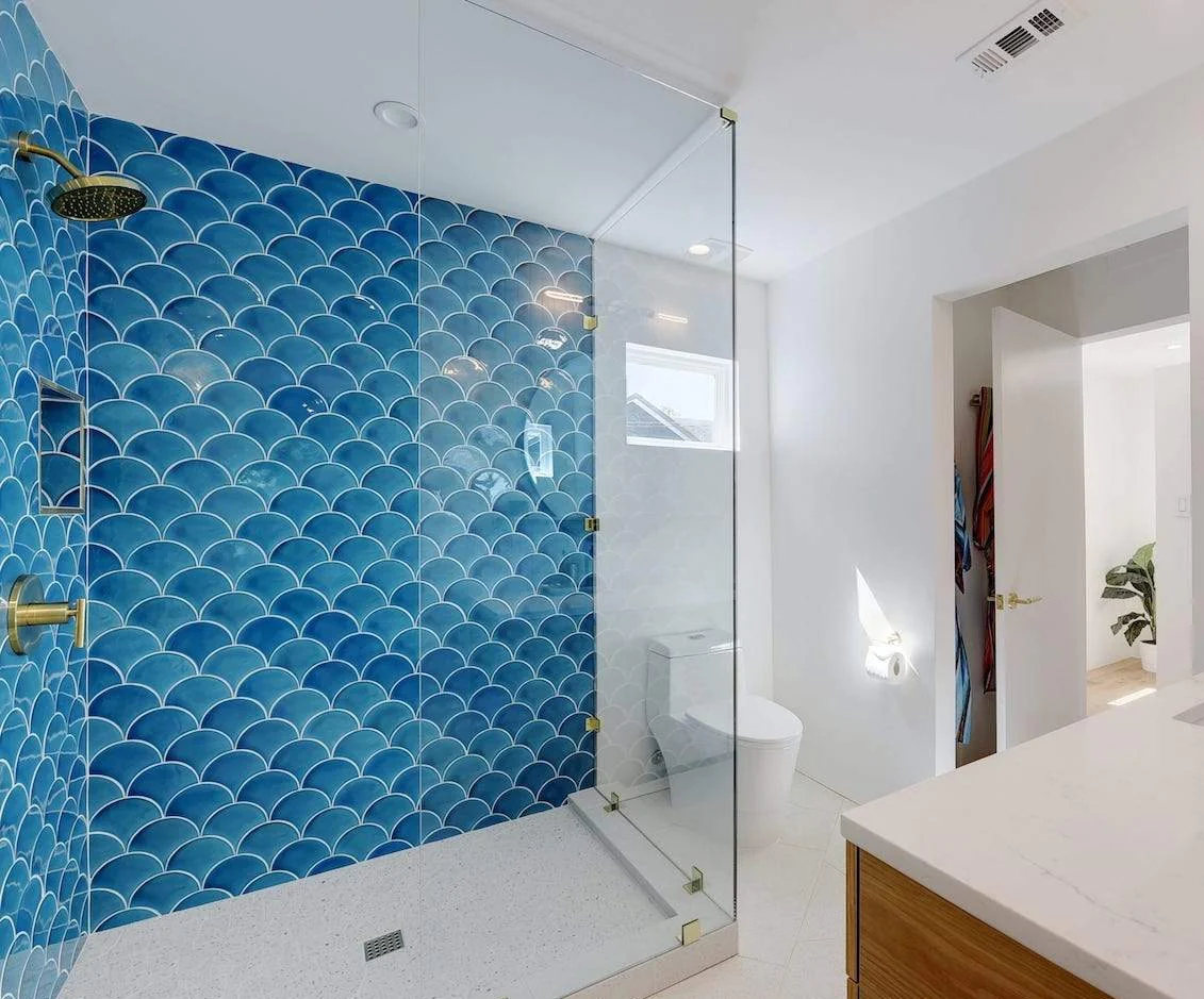 Modern bathroom design with blue fish scale tiles