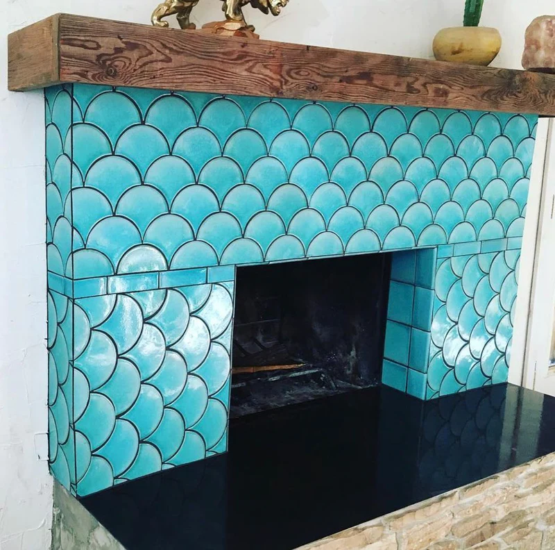 Modern fireplace design with fishscale tiles