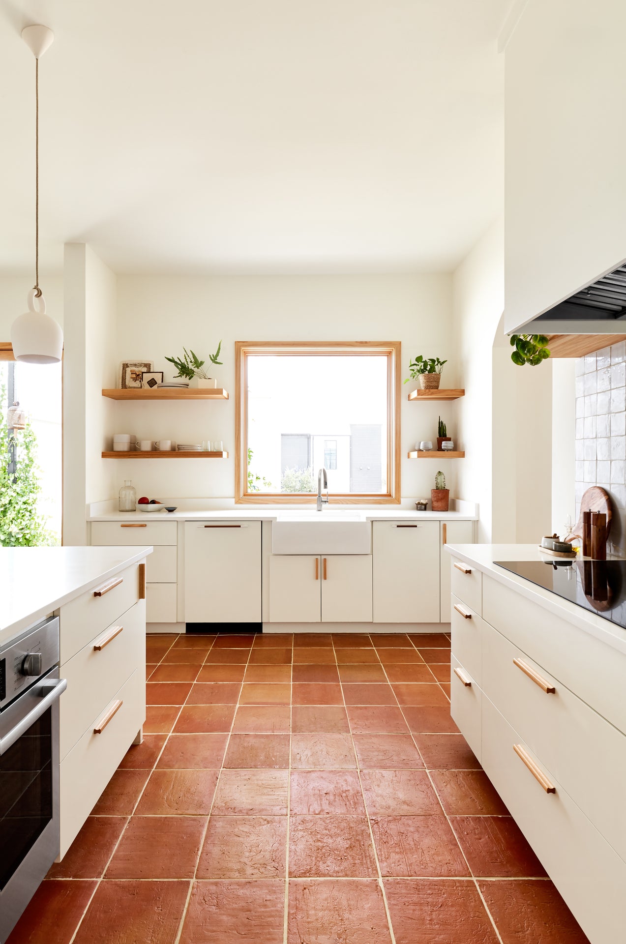 Modern kitchen design with terracotta tiles
