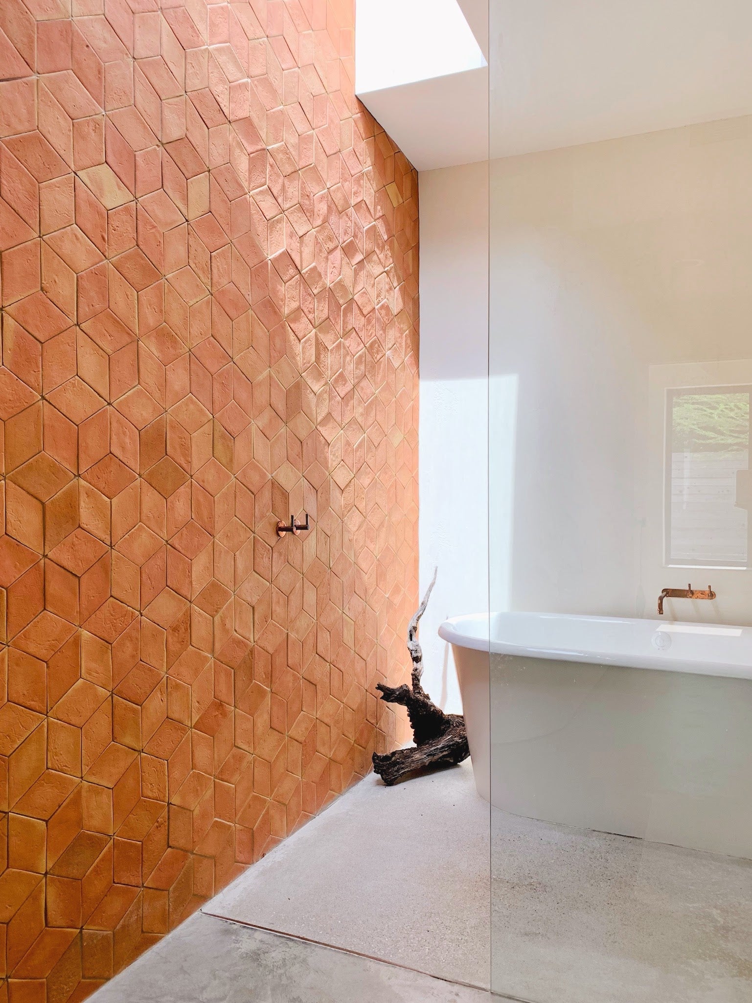 Terracotta diamond tile wall by clay imports