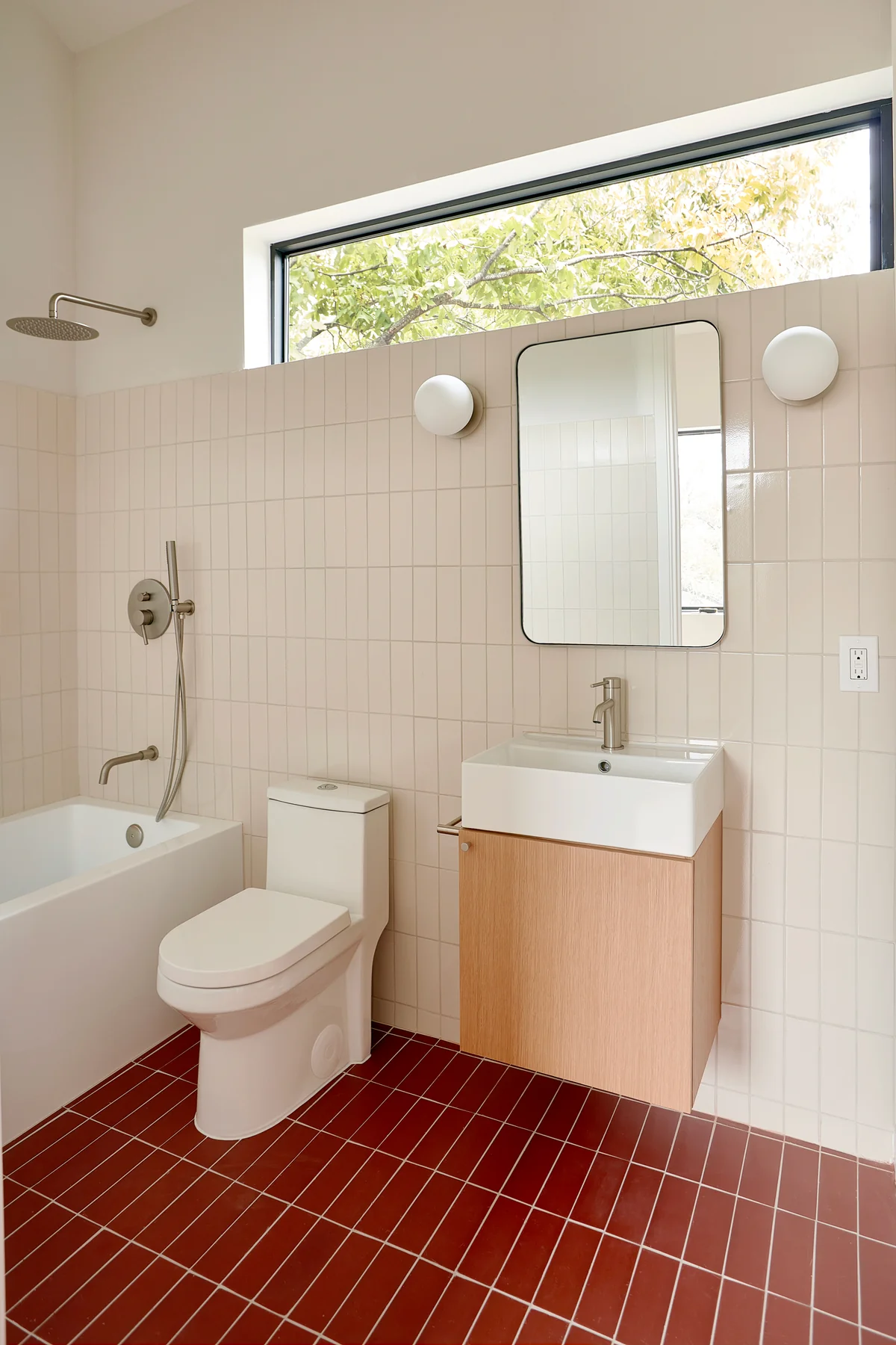 Bathroom with red and white tiles