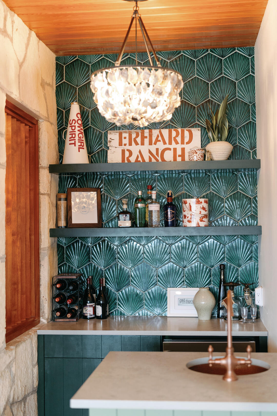 Kitchen backsplash with green hexagonal tiles