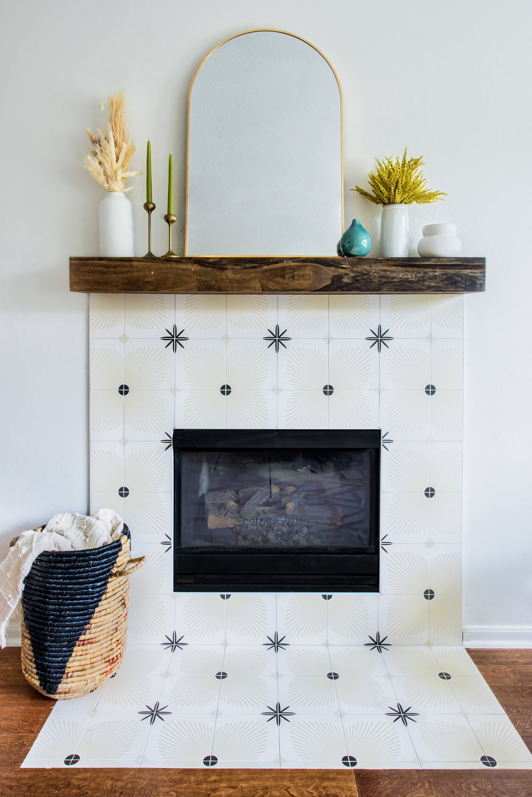 Modern fireplace design with white and black tiles