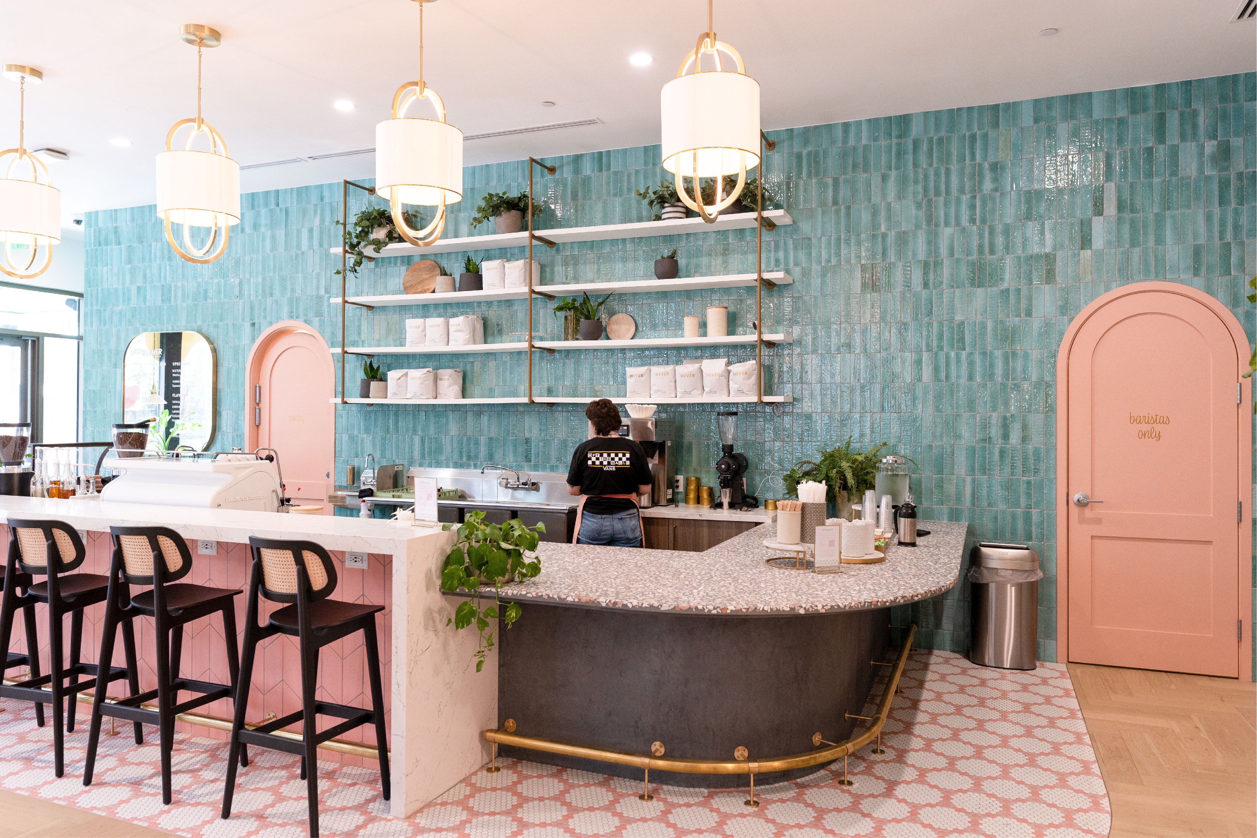 Café with green thin brick tile wall by clay imports