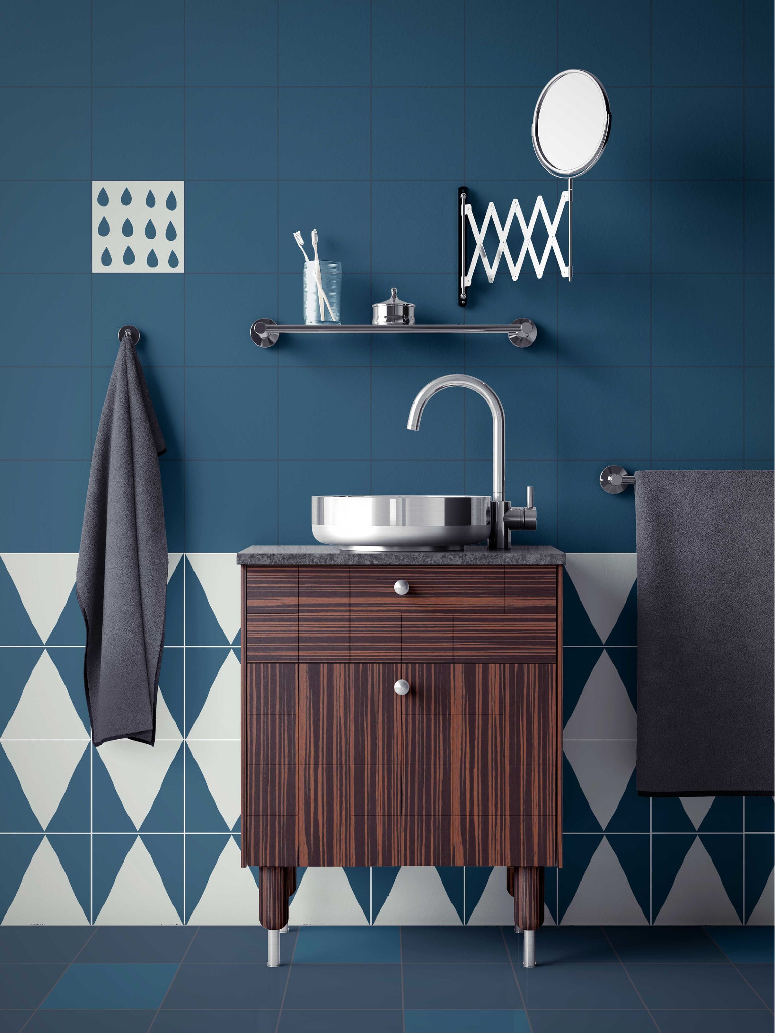 Bathroom with navy blue and white tiled wall by clay imports