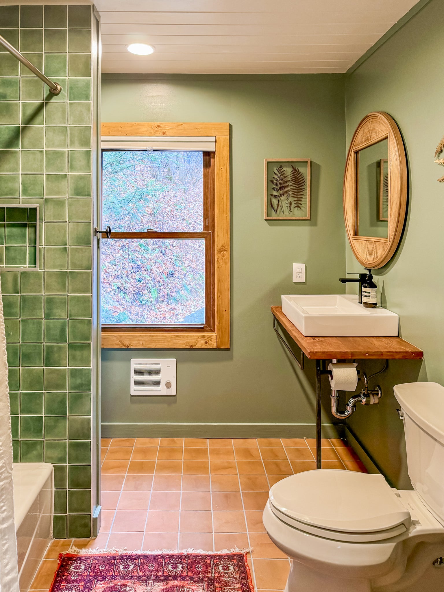 Modern bathroom design with light green tiles