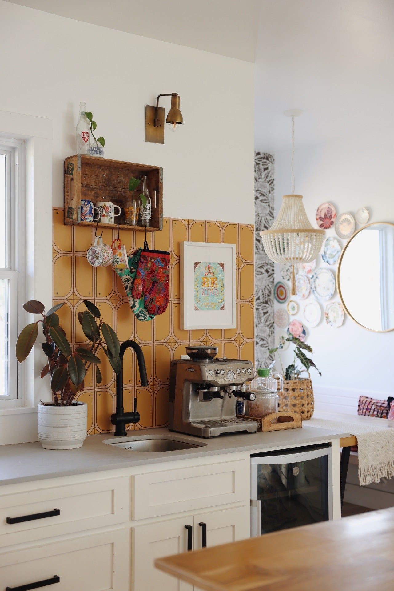 Modern kitchen backsplash with yellow and pink tiles