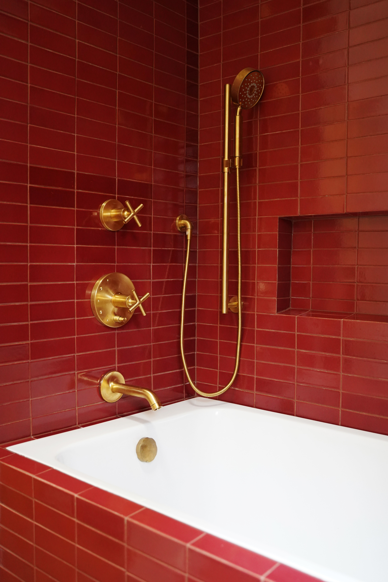 Modern bathroom design with red tiles