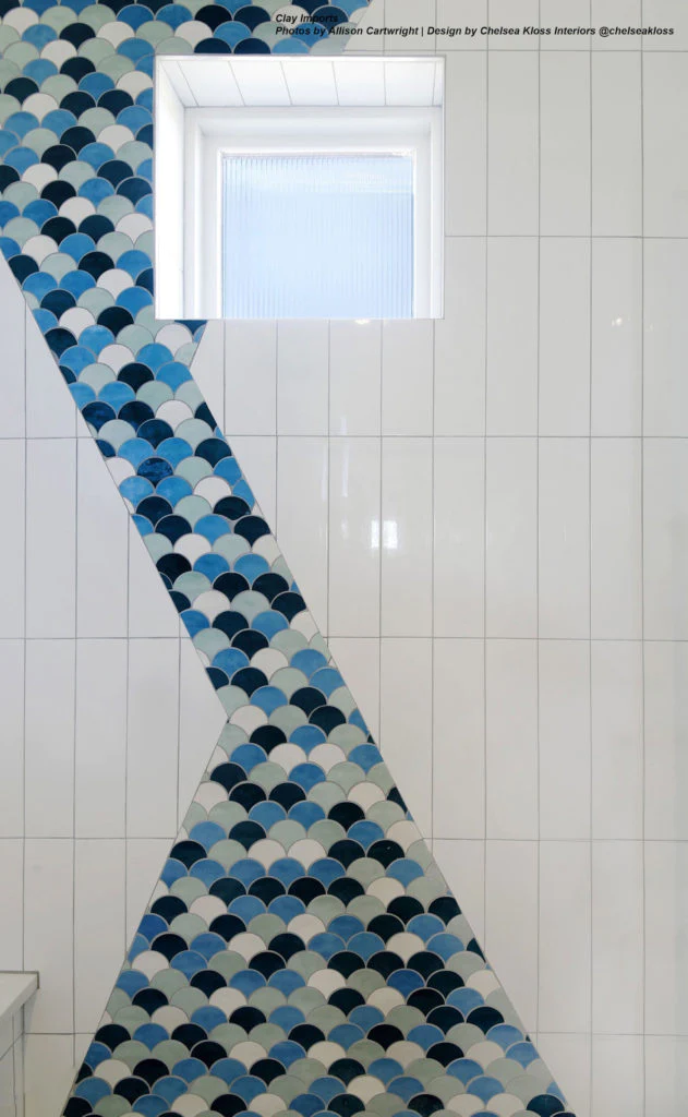 Shower niche with fish scale tiles