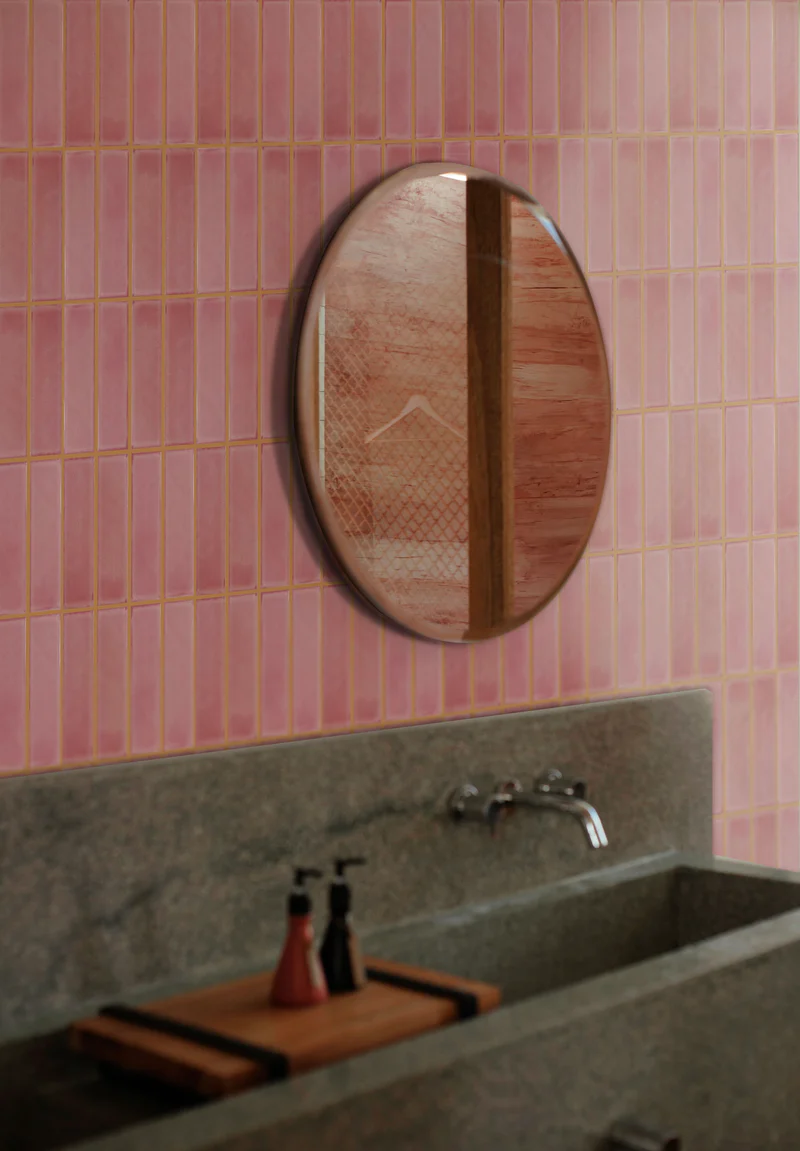 Confetti pink tiles on a bathroom backsplash