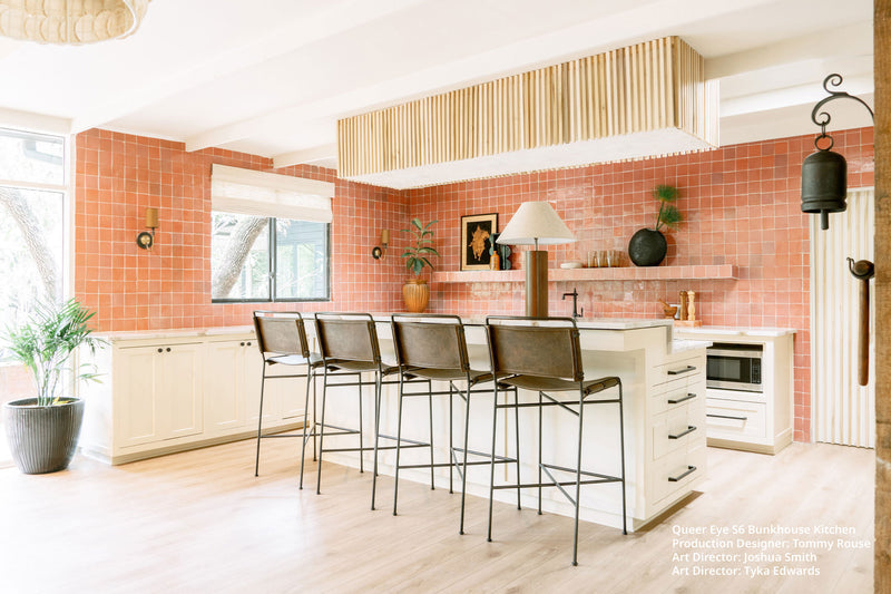 White kitchen with a pink tile backsplash