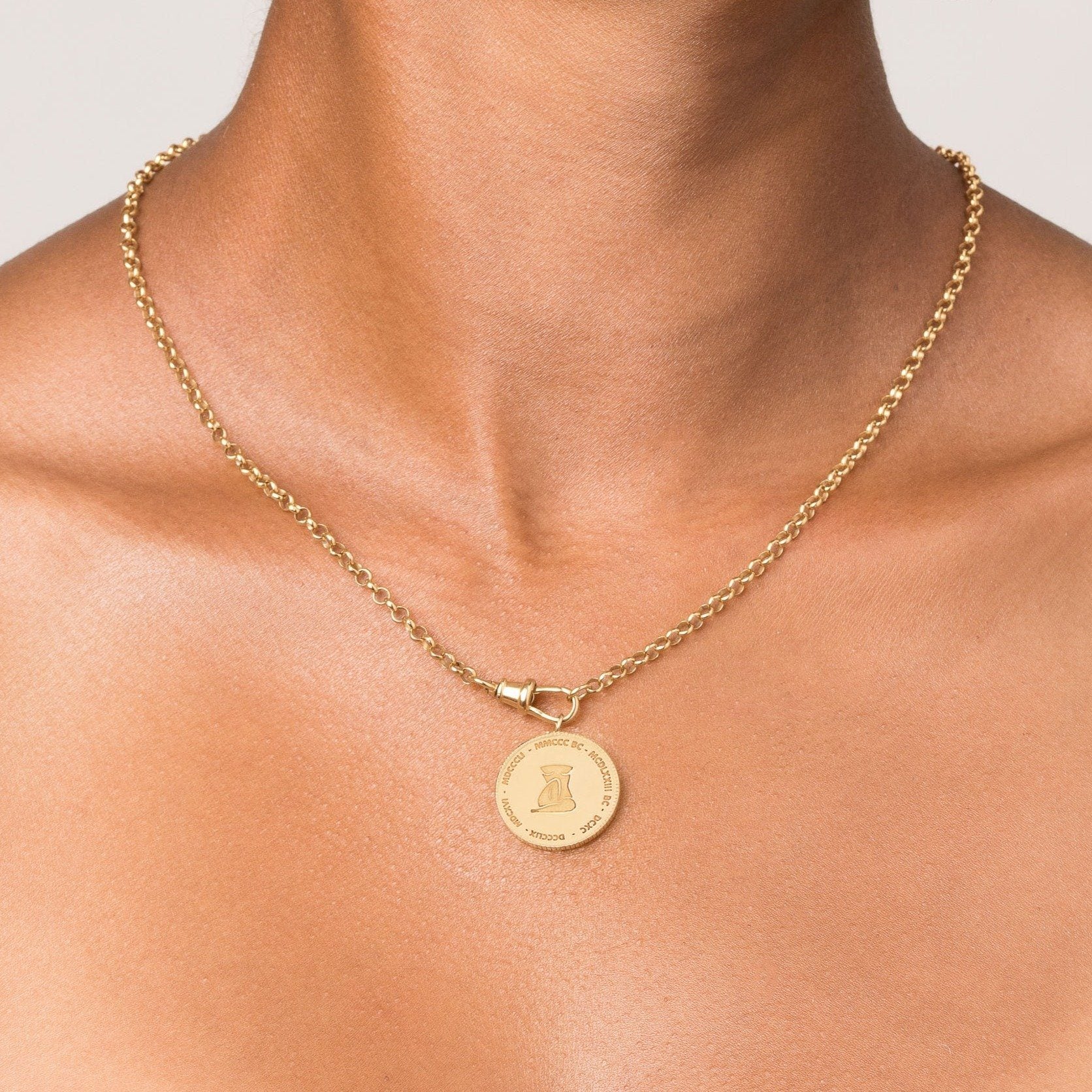 Femme Gold Pendant Necklace