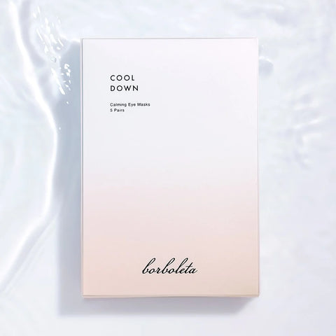 A pink and white ombre box of Borboleta Cool Down Calming Eye Masks in 5 pairs, on a white background with water ripples