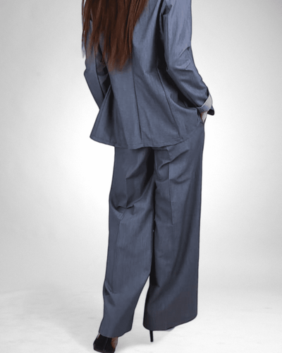 PANTALONE RIMINI<br>Tessuto fluido con tasche a palazzo