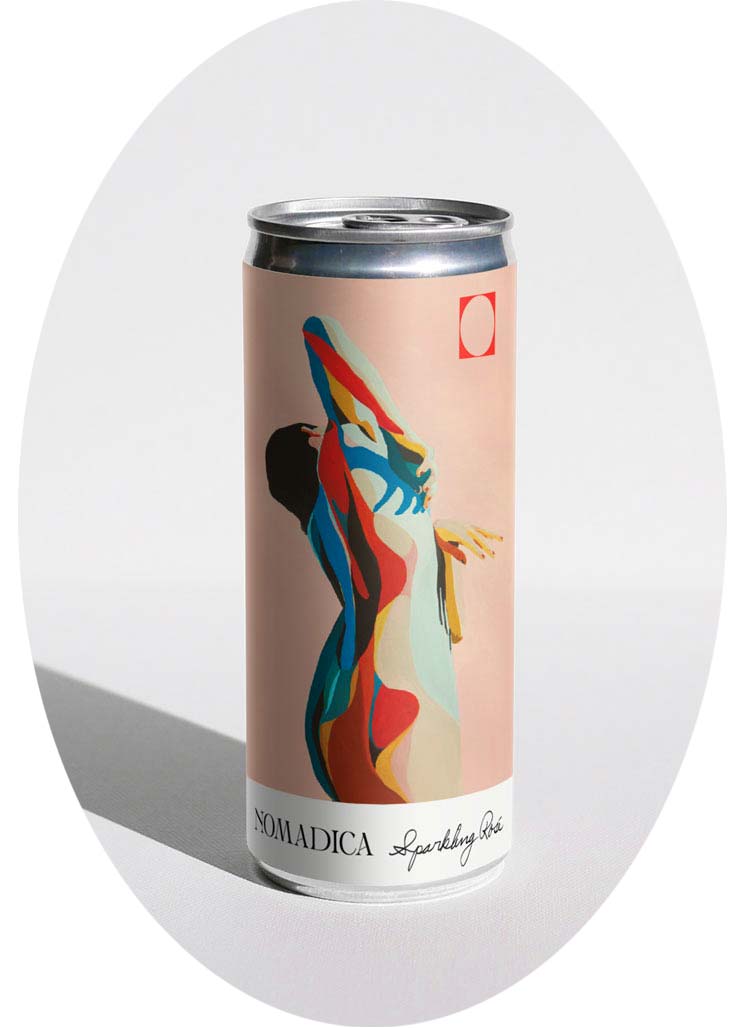 A decorated can of Nomadica Sparkling Rosé with abstract art.