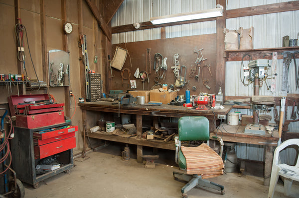 wide-shot-old-barn-s-workbench-with-different-types-tools
