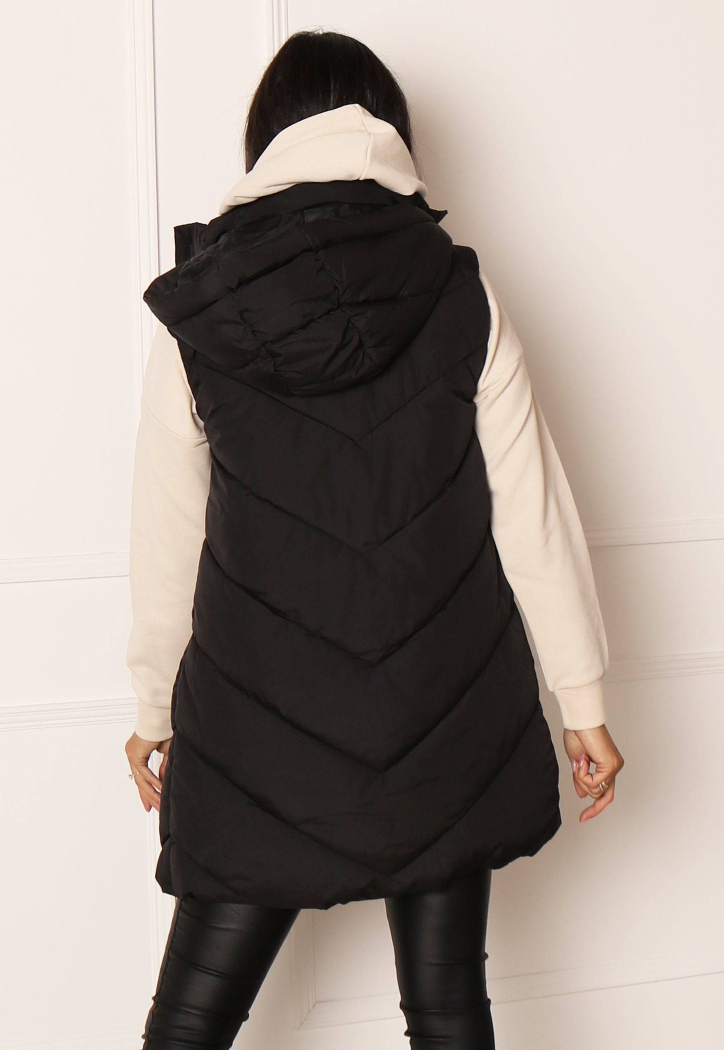 JDY Skylar Chevron Quilted Puffer Gilet with Hood in Black - concretebartops