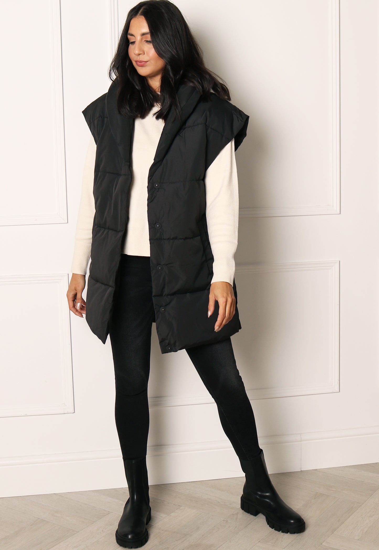 VILA Loui Longline Belted Puffer Sleeveless Puffer Gilet with Shawl Collar in Black - concretebartops