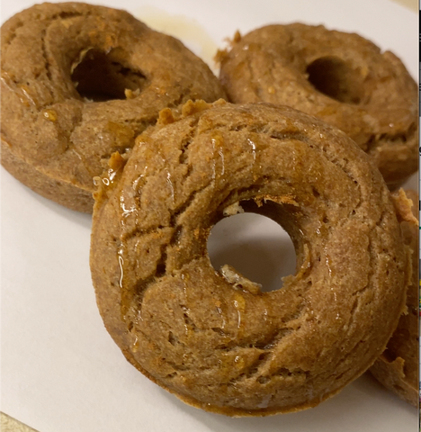 Dog donuts with honey drizzle and a sprinkle of cinnamon