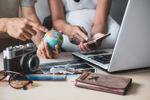 couple making travel plans with airport