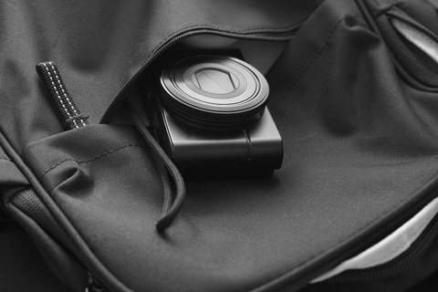 black camera in black bag