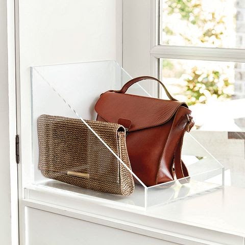 handbag and purse on counter in house