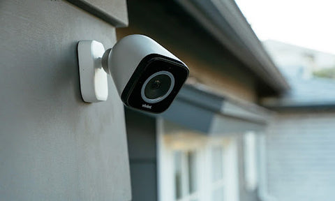 outdoor security camera on house